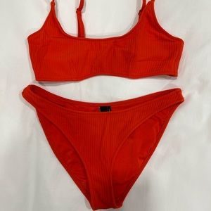 Triangl orange ribbed bikini set. Size M/L